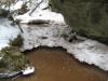 Deep brown pool of water